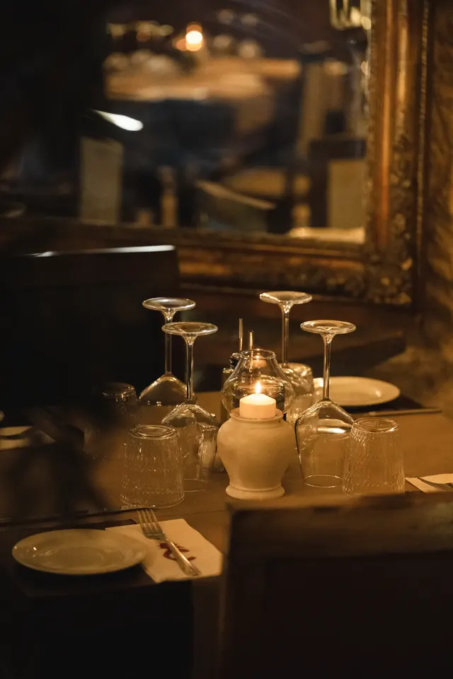 Candlelit table set for dinner